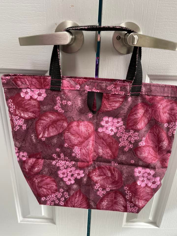 Large Shopping Tote features pink, mauve and maroon leafy floral fabric